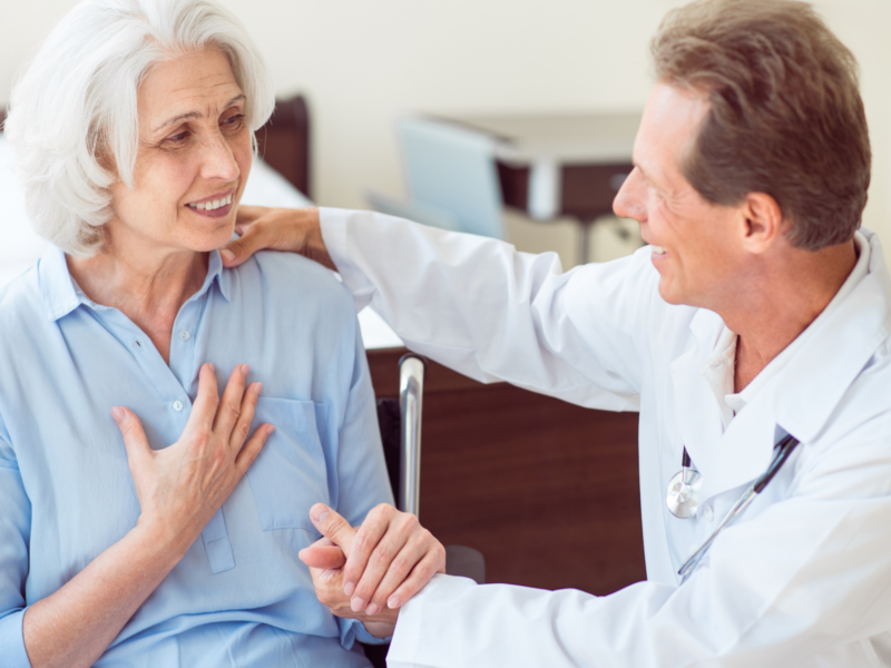 pain management specialist with female patient